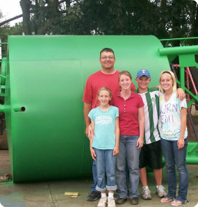 Brianne's family in front of the water tower.