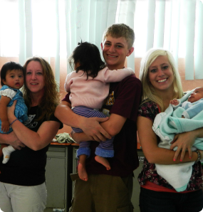 Brianne and her siblings with kids at the orphanage.