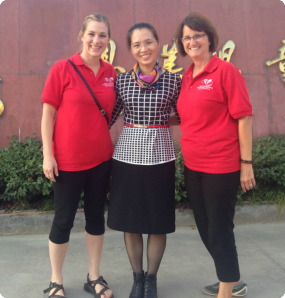 Laura Chapeau, Waiting Identified Social Worker, with orphanage staff and Red Thread Charities volunteer.