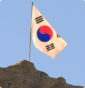 The Korean flag on a bluff.