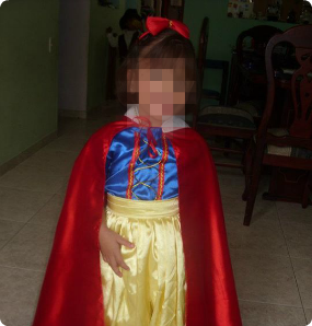 A picture of M dressed up as Snow White, blurred to respect her privacy.