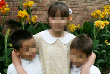 A blurred photo of a sister and two brothers who wait in Latin America for an adoptive family.