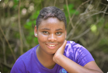 A picture of Ja'Mya, an energetic teen waiting in foster care for an adoptive family.