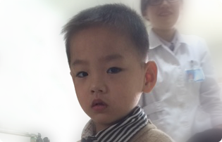 A picture of ZM, one of the boys in Asia who need families, taken at the orphanage this week.