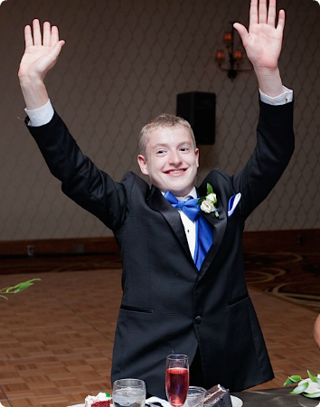 A picture of Leon, who was adopted from foster care, at his dads' wedding.