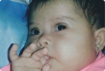 A 4-month-old girl waiting in Latin America for an adoptive family.