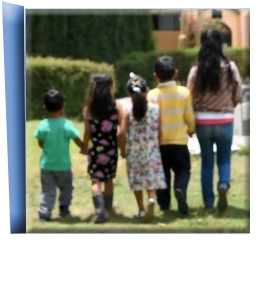The fourth door is opened to reveal a picture of five siblings walking away from the camera. Click the image to learn more about them.