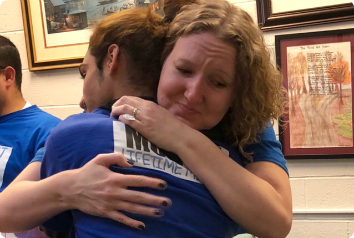A picture of the blogger hugging her son on his adoption day.