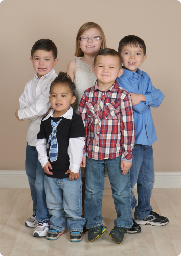 Five siblings adopted from foster care so they can stay together.
