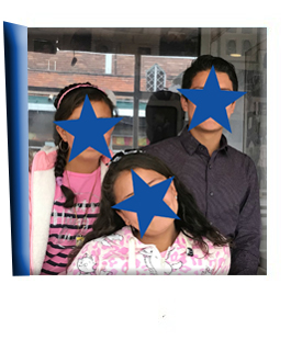 A censored photo of three siblings with stars over their faces is revealed. Click on the picture to learn more about them.