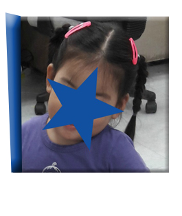 A censored photo of HN is revealed. She waits in Asia for an adoptive family.