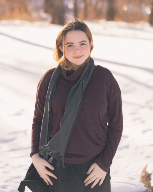 16-year-old teen wearing scarf outside in winter