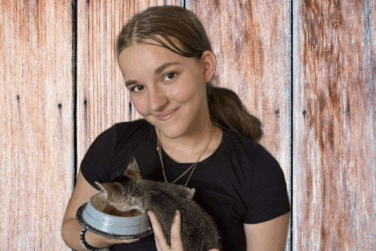 photo of waiting child Kaitlynn with a kitten