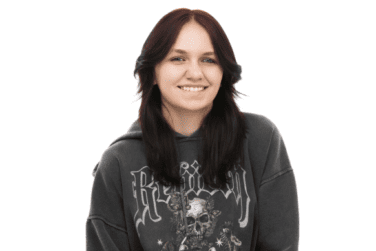 Makenna wearing a black sweatshirt and smiling