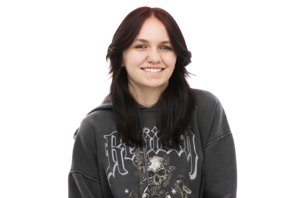 Makenna wearing a black sweatshirt and smiling