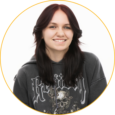 waiting child Makenna wearing a black sweatshirt and smiling